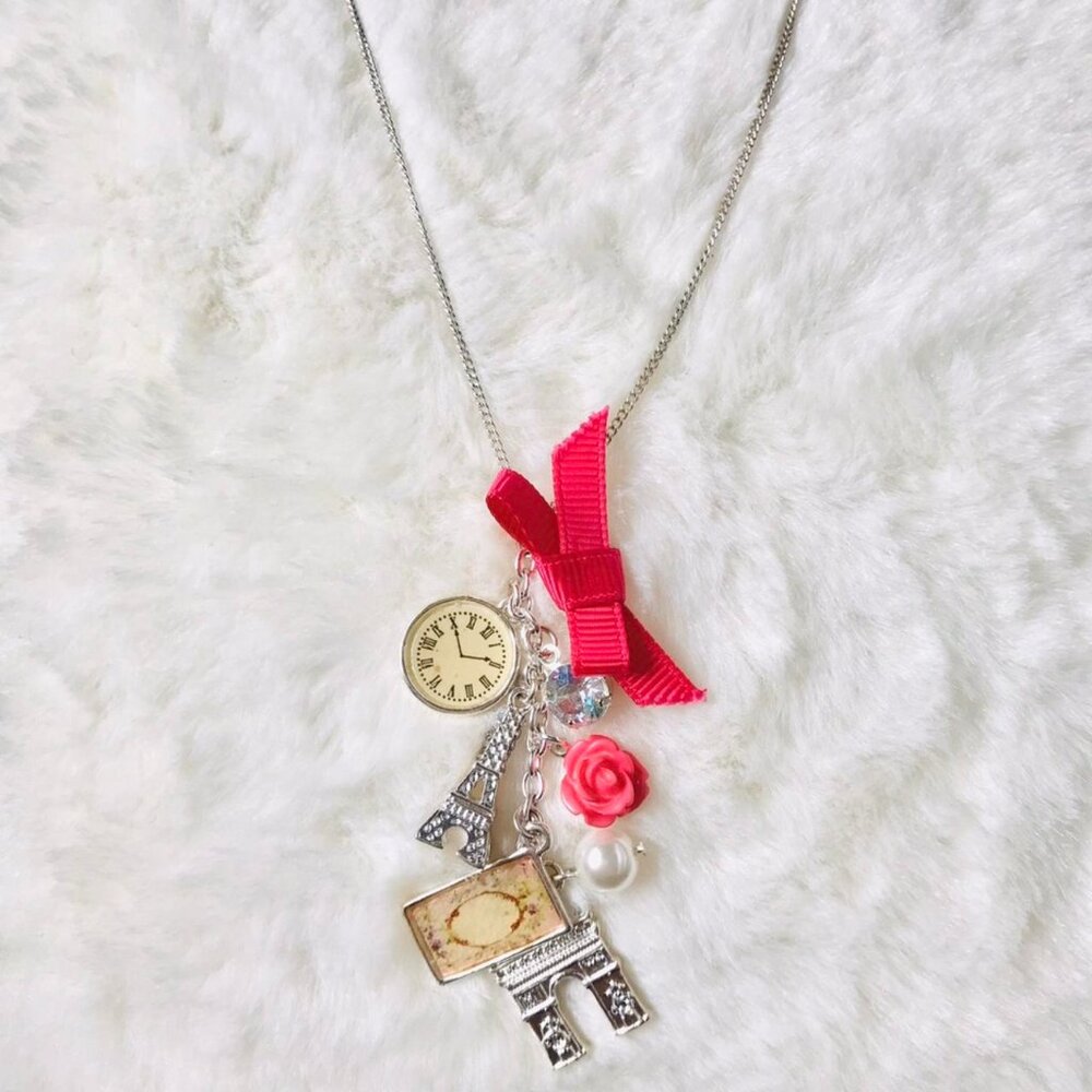 claire's silver and pink y2k paris bow charm necklace